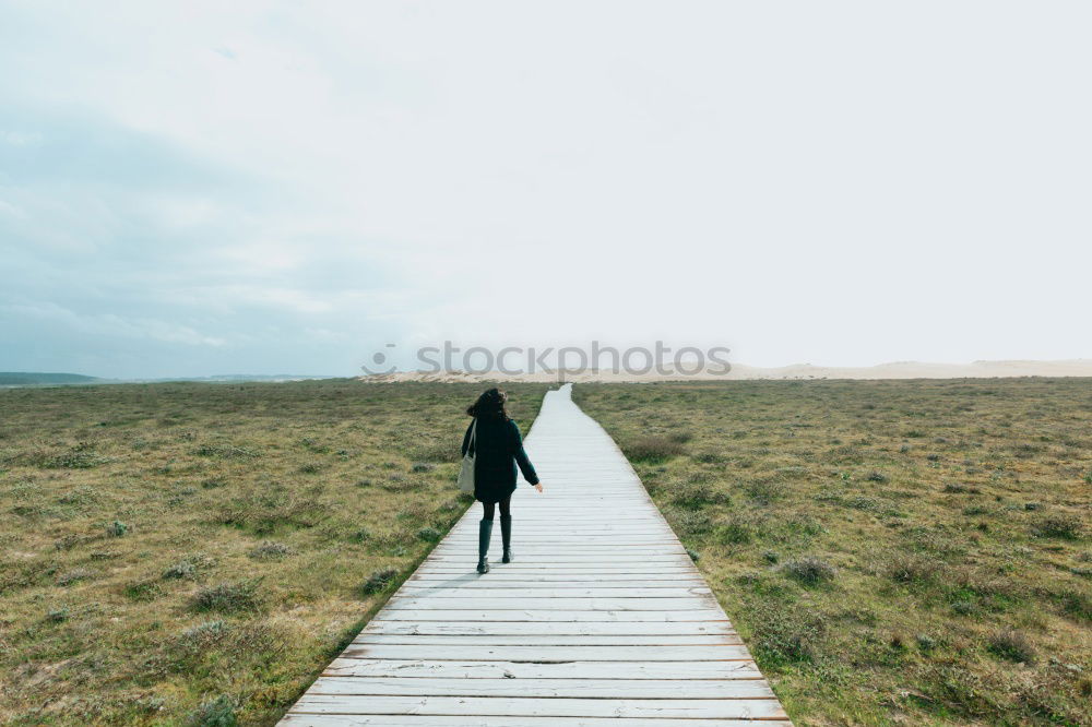 Similar – Man running on railroad