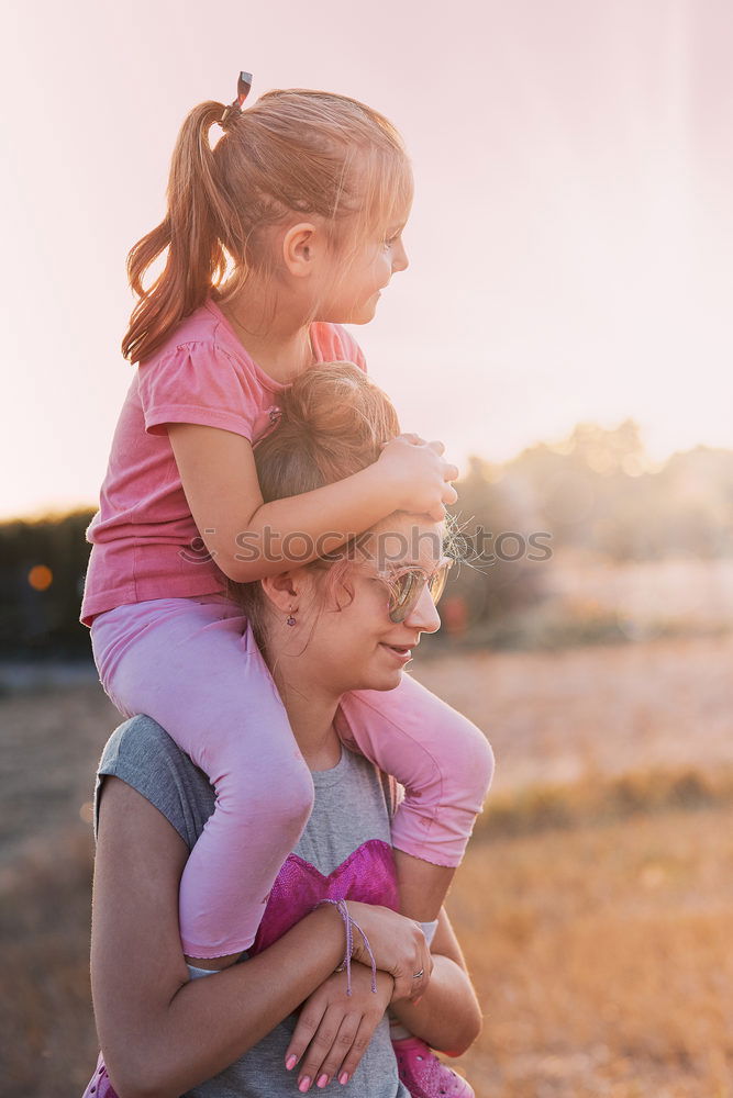 Similar – Image, Stock Photo Adorable girl and her mother in a summer day