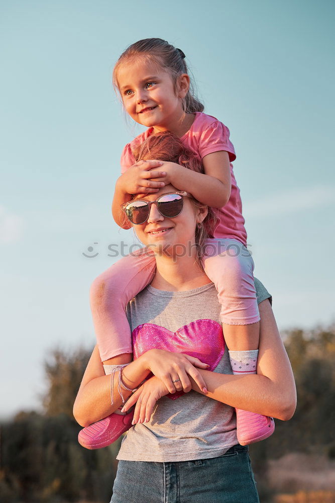 Similar – Couple in Fitness Attire Ready for Outdoor Workout