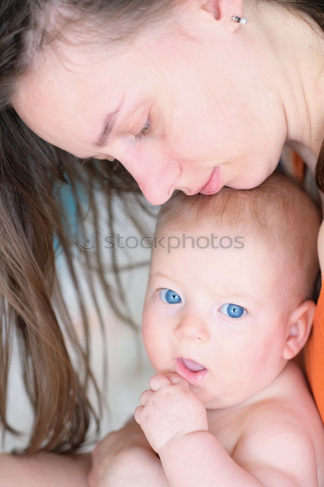 Similar – Image, Stock Photo Portrait of a mother with her baby at home.