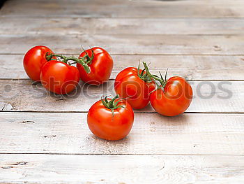 Similar – Image, Stock Photo Close-up of fresh, ripe tomatoes on wood background