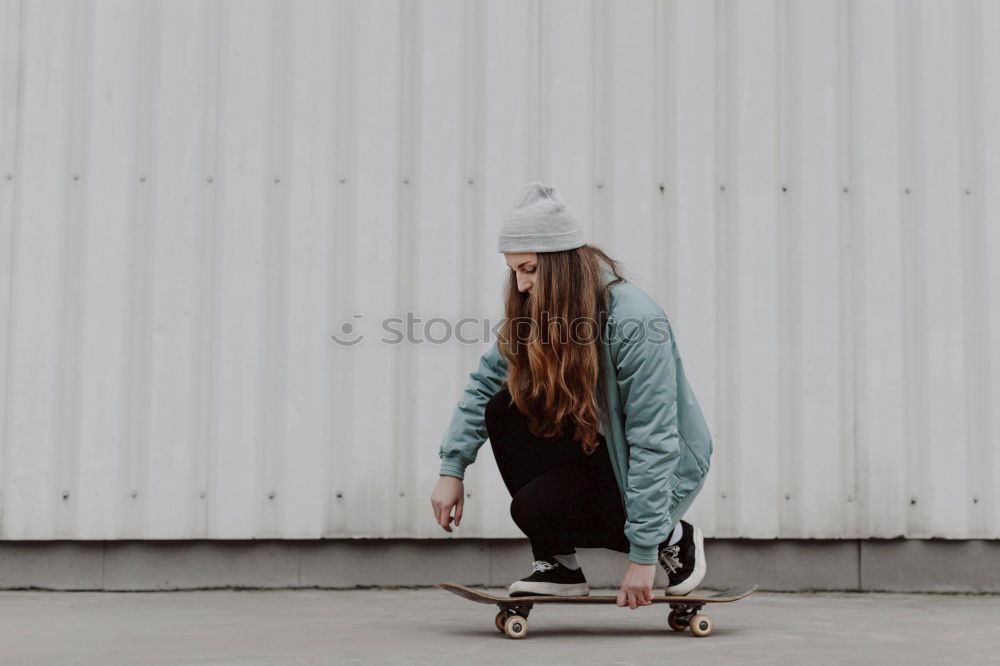 Similar – Cool skateboard woman at a public graffiti park