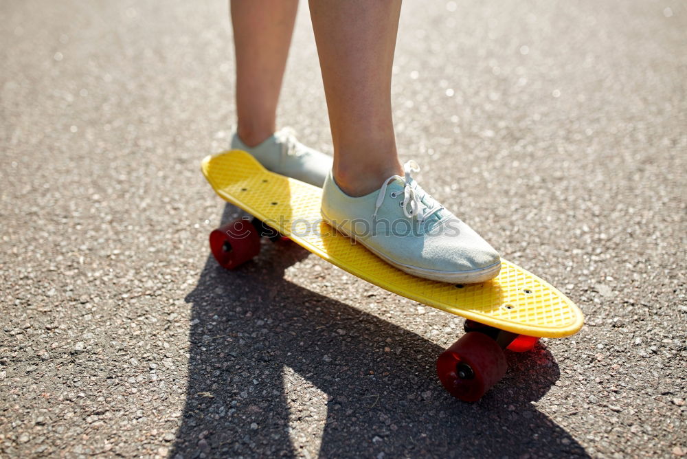 Similar – Person rides the skateboard