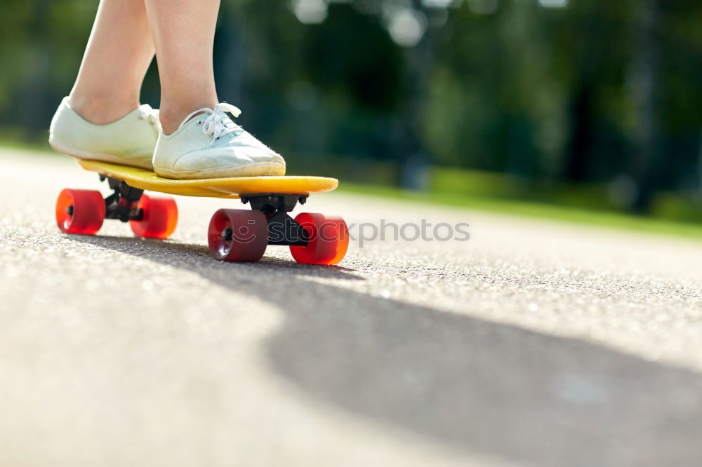 Similar – Person rides the skateboard