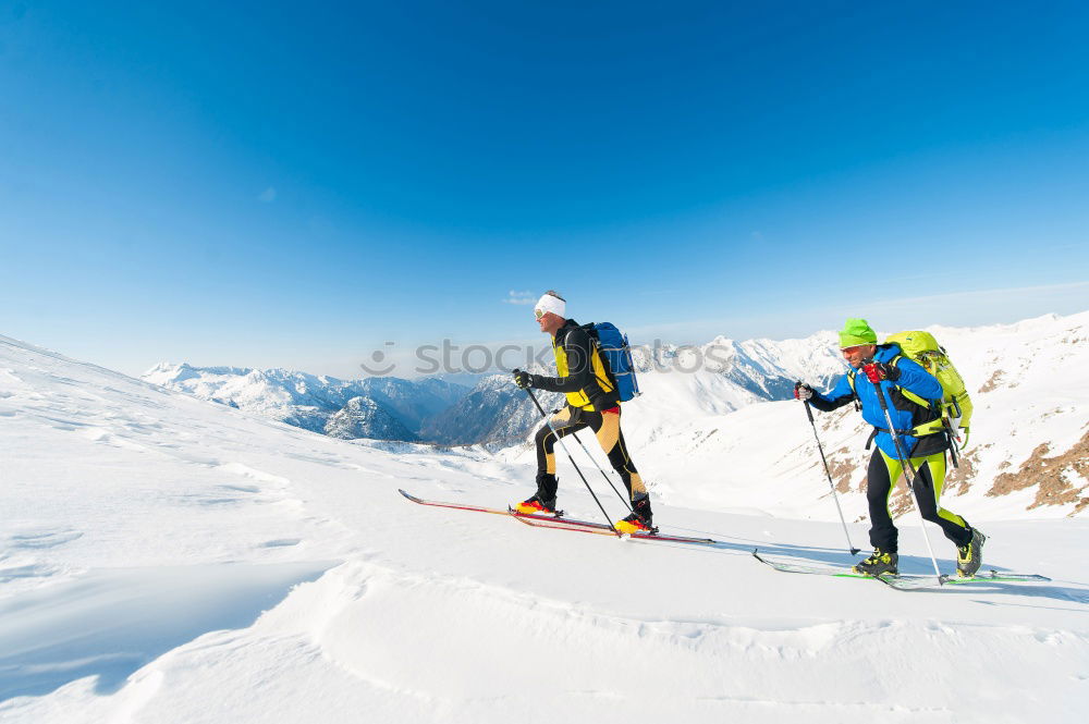 Similar – Image, Stock Photo Two skiers going downhill in powder snow