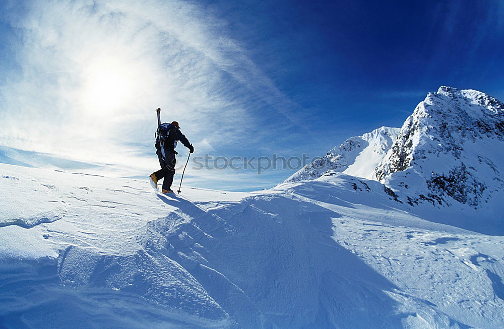 Similar – Image, Stock Photo Mountaineer climbs a snowy peak.