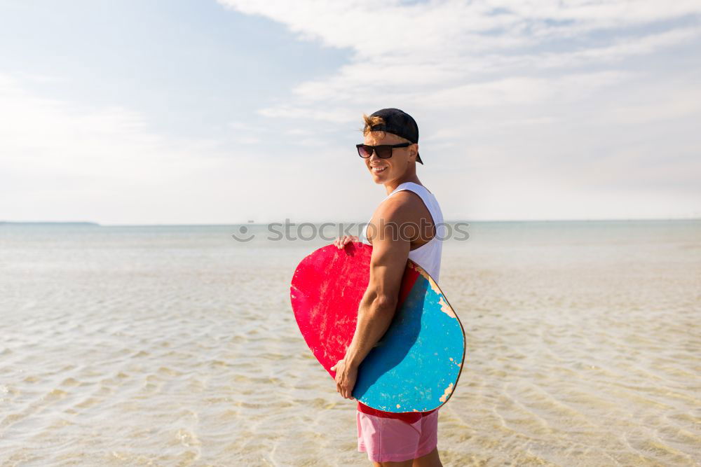 Similar – Man with skateboard looking at sea