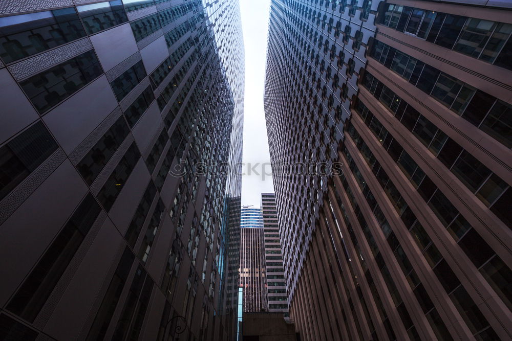 Similar – Man climbing the stairs to the skyscraper