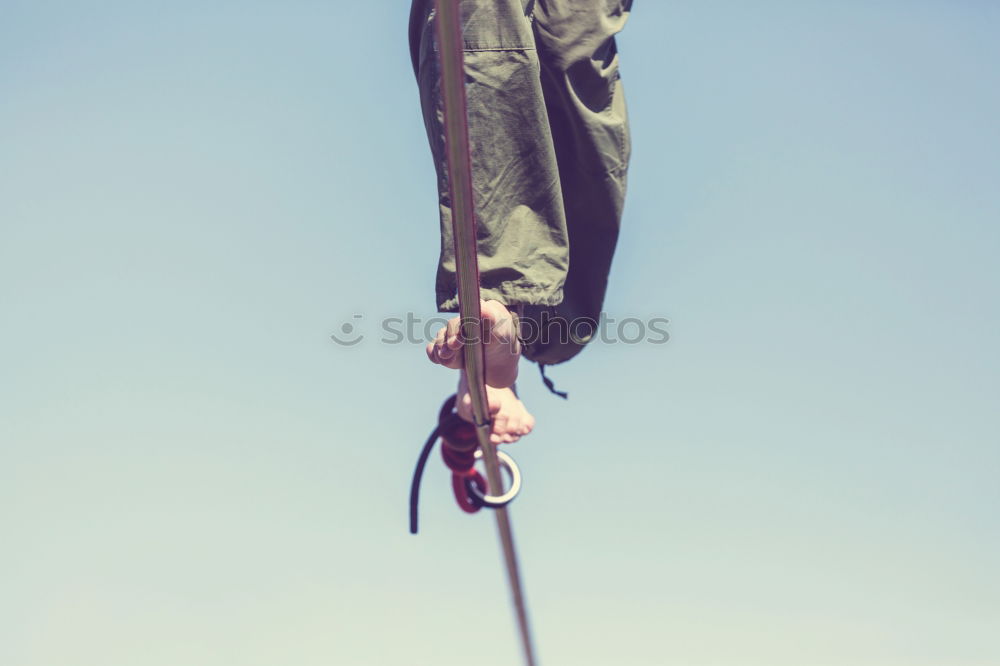 Similar – Woman with afro hair climbing by children’s attractions.