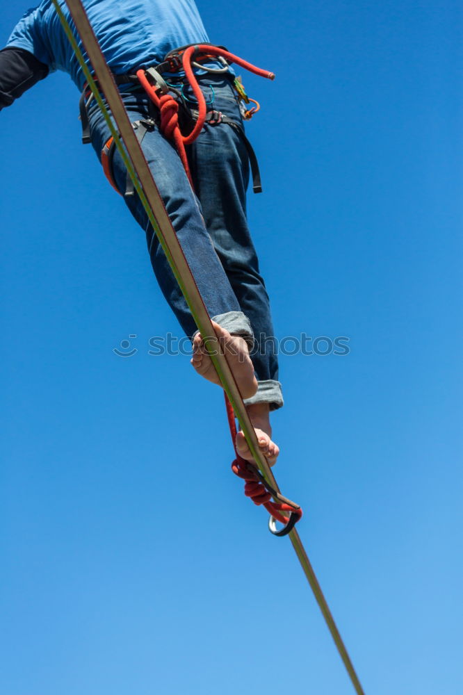 Similar – Woman with afro hair climbing by children’s attractions.