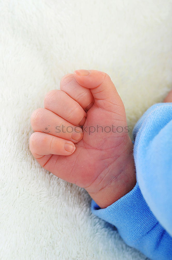 Similar – Hand of a small baby