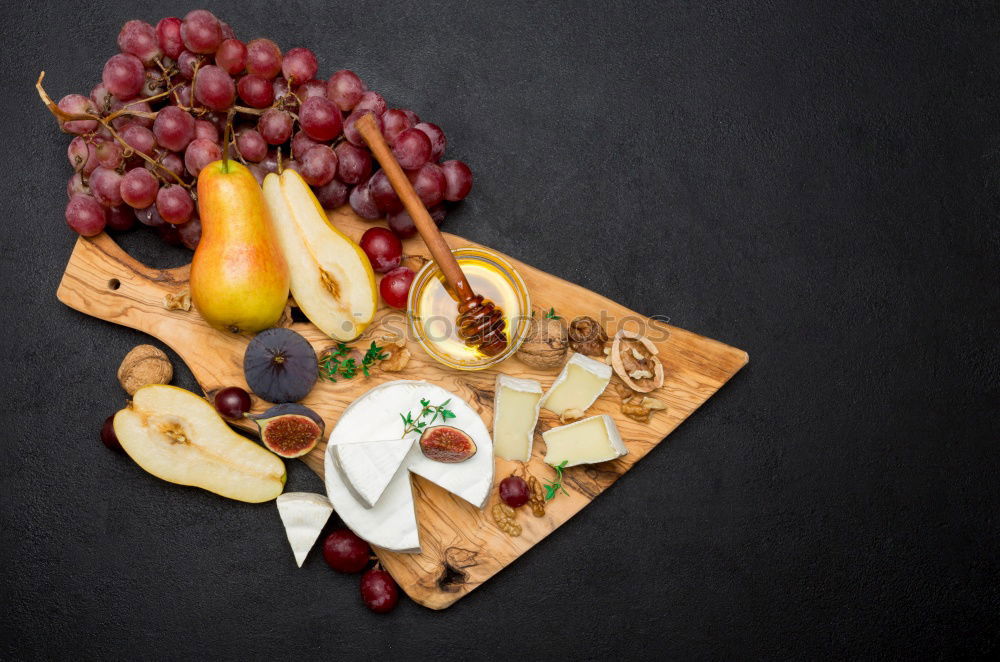 Similar – Image, Stock Photo Rustic cheese platter with various cheeses