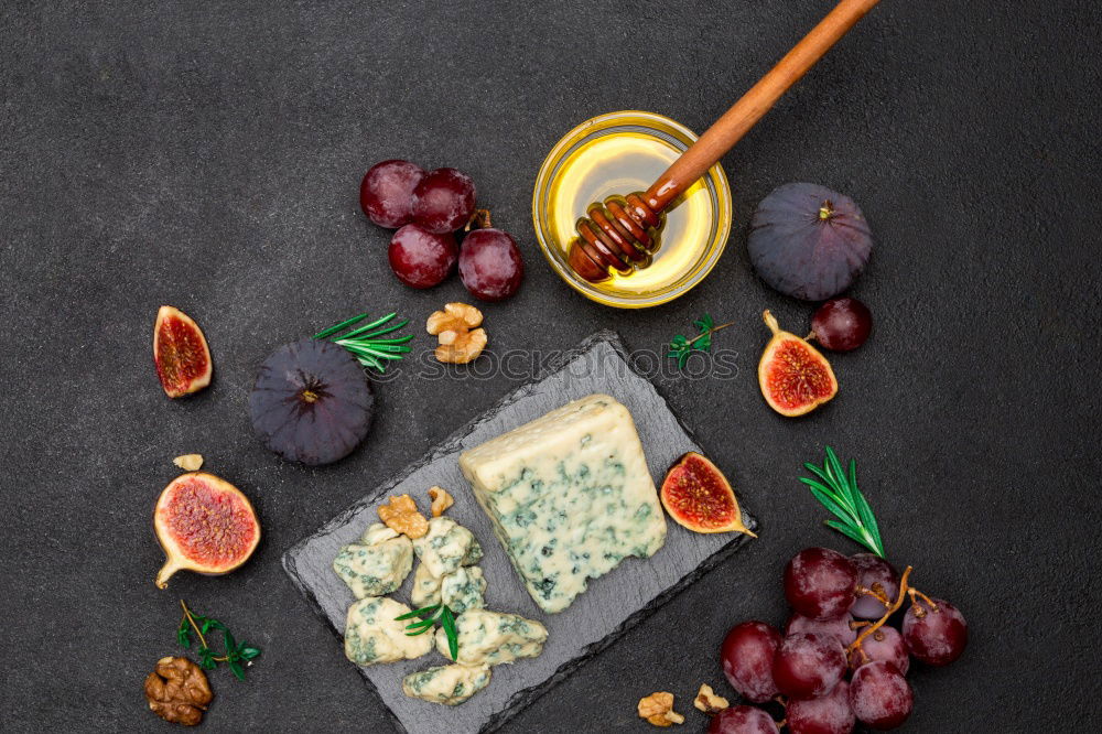 Similar – Image, Stock Photo Rustic cheese platter with various cheeses