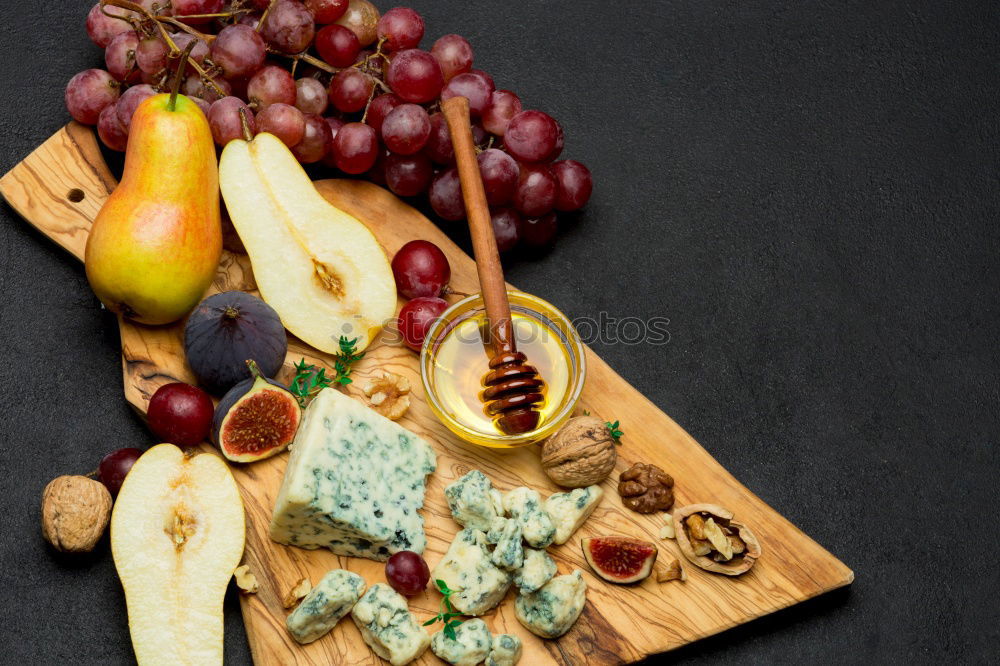 Similar – Image, Stock Photo Rustic cheese platter with various cheeses