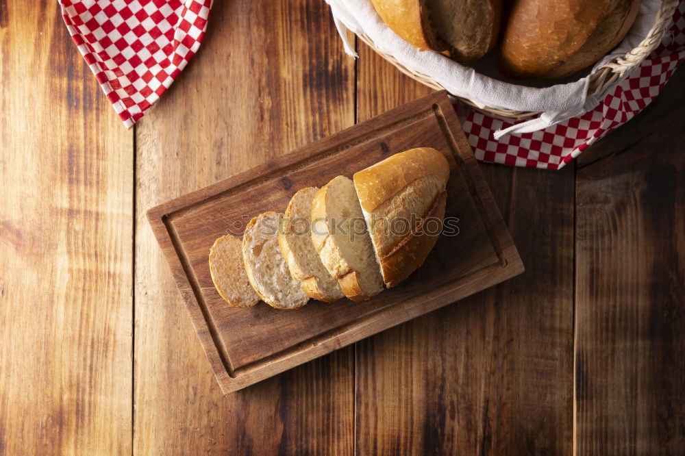 Similar – fresh bread and baked goods on wooden