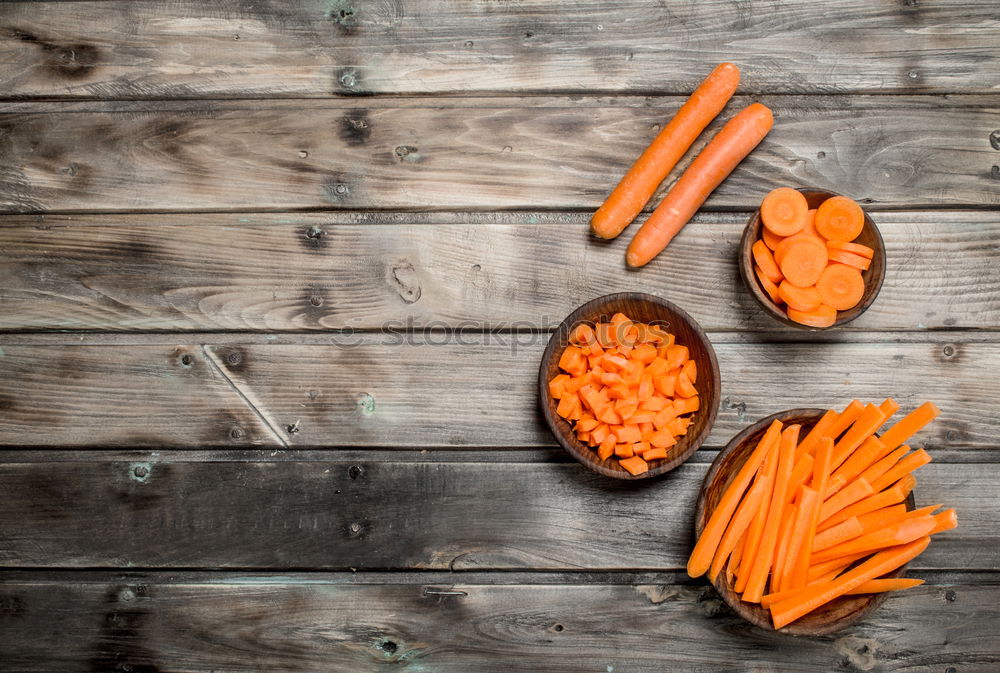 Similar – Cut into round slices of a big fresh carrots