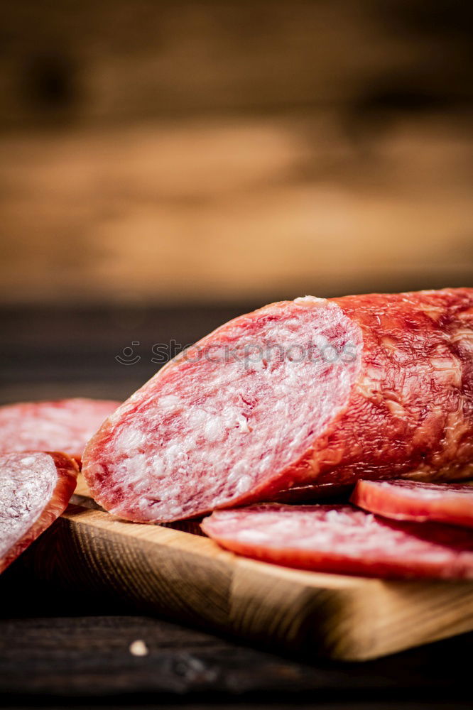 Similar – Image, Stock Photo Schnitzel meat on a rustic wooden table