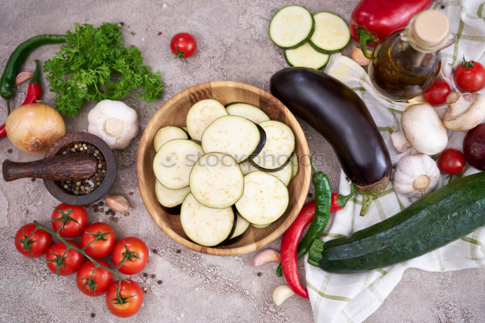 Similar – Image, Stock Photo Tomato and cucumber salad on a kitchen board