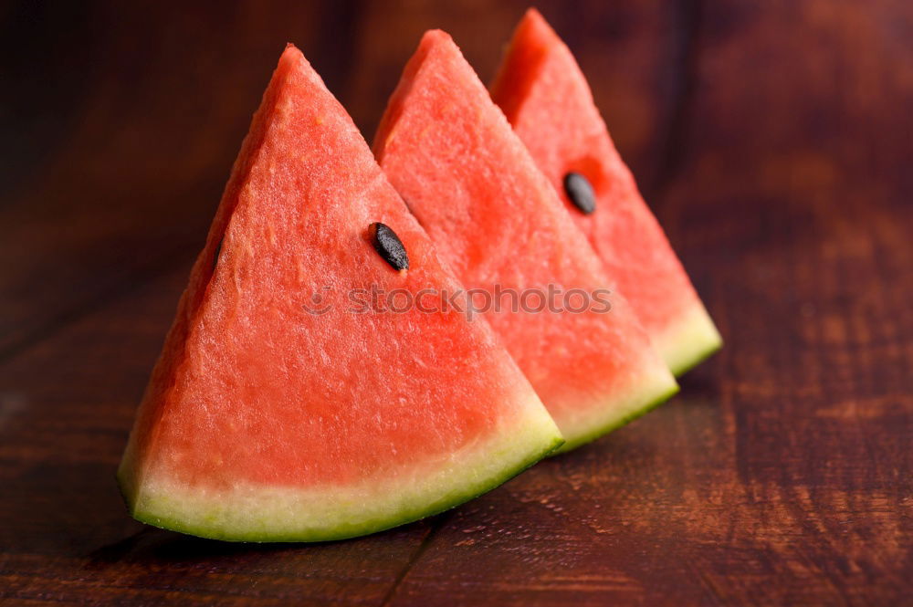 Similar – Half of the watermelon