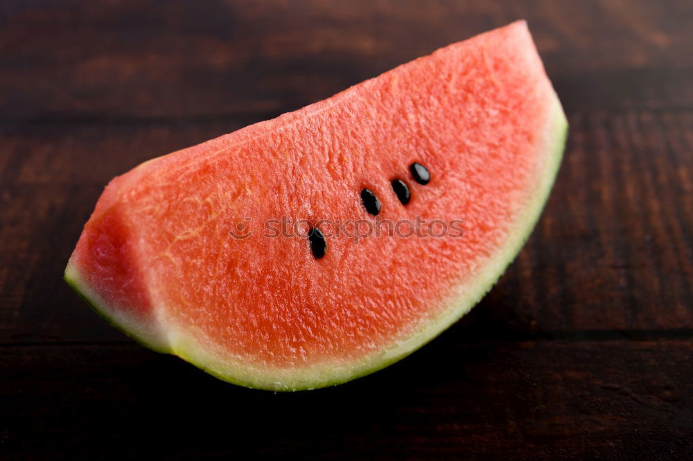 Similar – Half of the watermelon