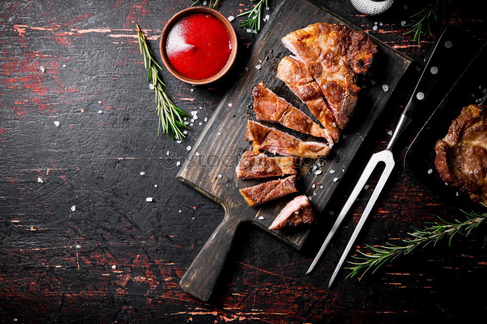 Similar – Image, Stock Photo Sliced grill steak on cutting board with wine and spices