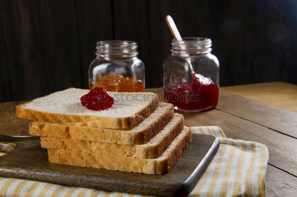 Similar – Image, Stock Photo Toast bread with wild strawberry jam. Retro,vintage filter