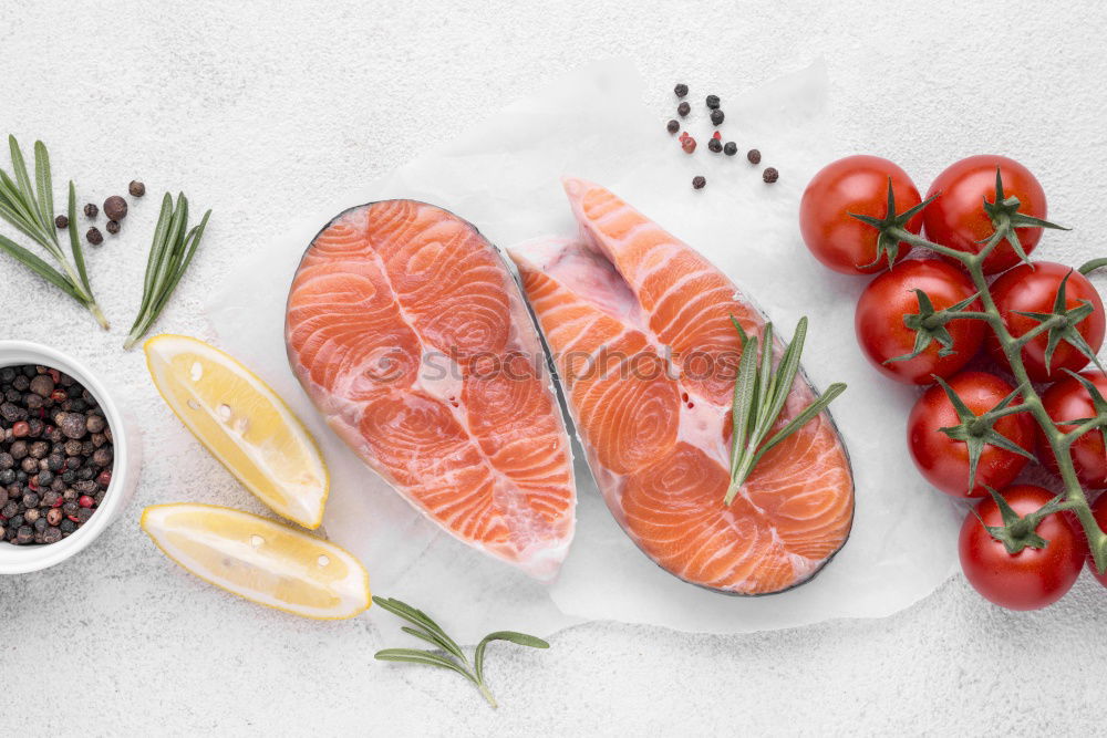 Similar – Salmon with spinach on a white kitchen table