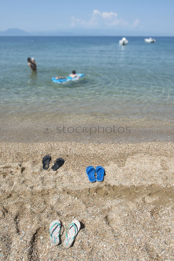 Image, Stock Photo Slippers in the sand on the beach