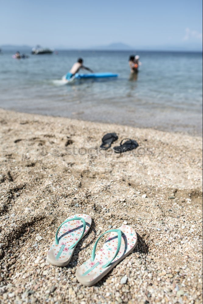 Similar – Image, Stock Photo Slippers in the sand on the beach