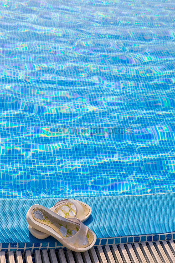 Similar – Man feet in the pool water