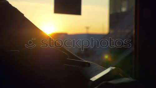 Stylish man driving old timer at night