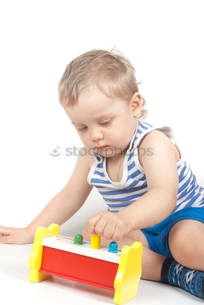 Similar – Image, Stock Photo Happy baby playing with toy blocks.