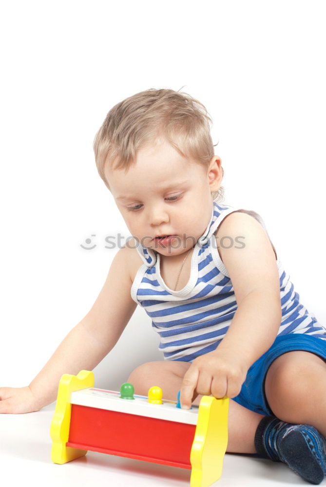 Similar – Image, Stock Photo Happy baby playing with toy blocks.