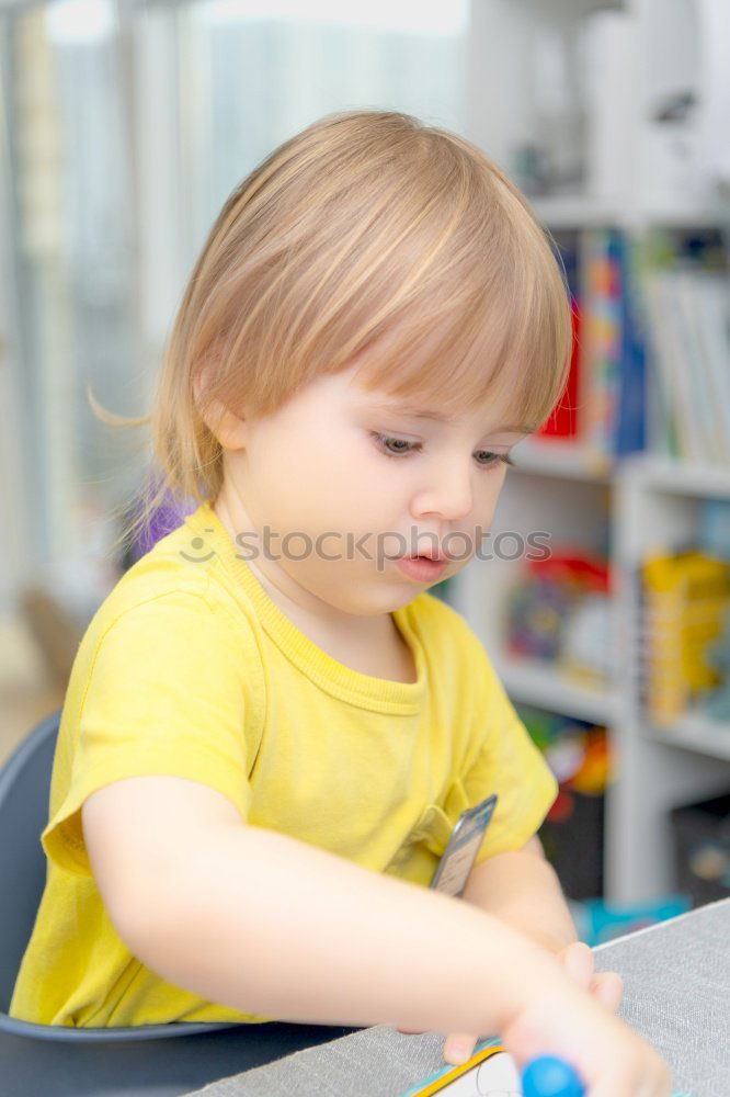 Similar – Happy baby playing with toy blocks.