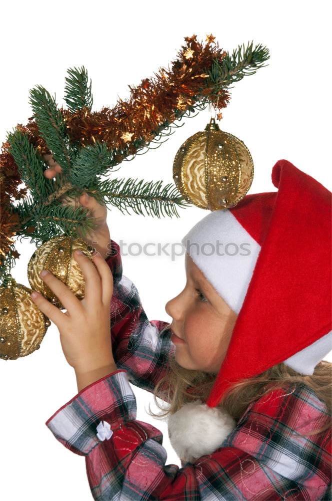 Similar – Foto Bild Junges Mädchen schmückt Weihnachtsbaum, hält große Weihnachtskugel. Junges blondes Mädchen in blauem Jeansrock, rosa Bluse und Strumpfhose. Mädchen hat eine lustige Rentiermaske auf dem Gesicht. Junges Mädchen feiert Weihnachten zu Hause