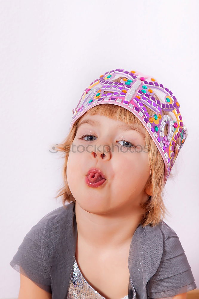 Image, Stock Photo Little girl sticking out her tongue