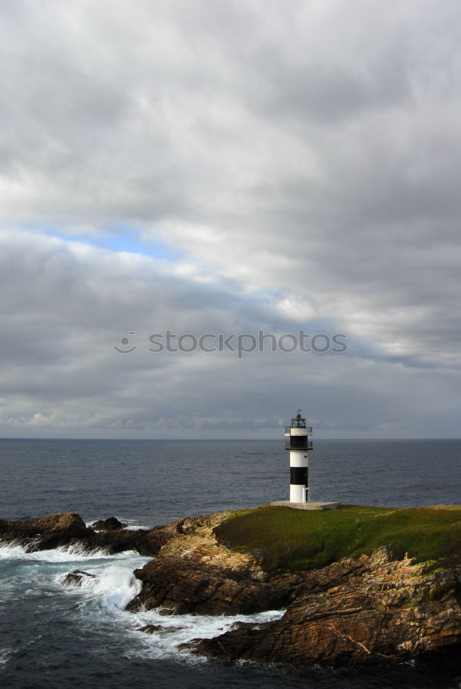 Similar – Image, Stock Photo Lighthouse in Cornwall with clouds in portrait format