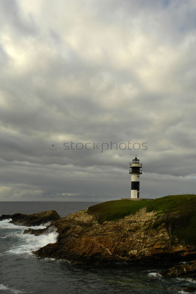 Similar – Image, Stock Photo Lighthouse in Cornwall with clouds in portrait format