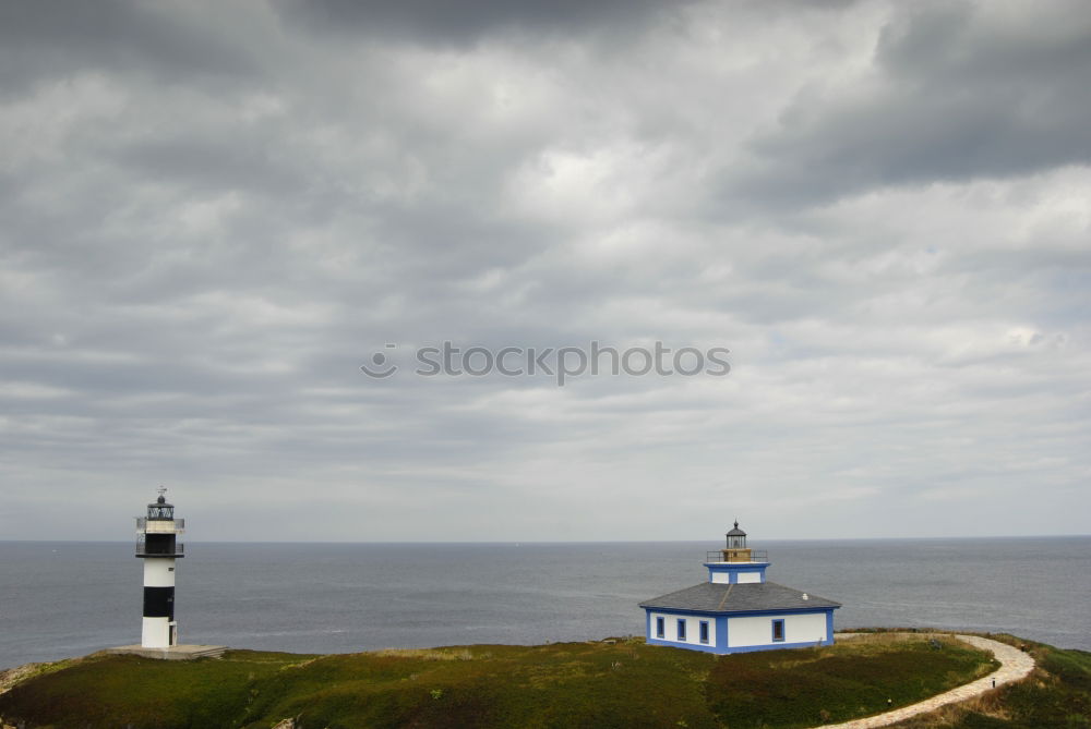 Similar – Foto Bild Leuchtturm vor Meer bei bewölktem himmel.