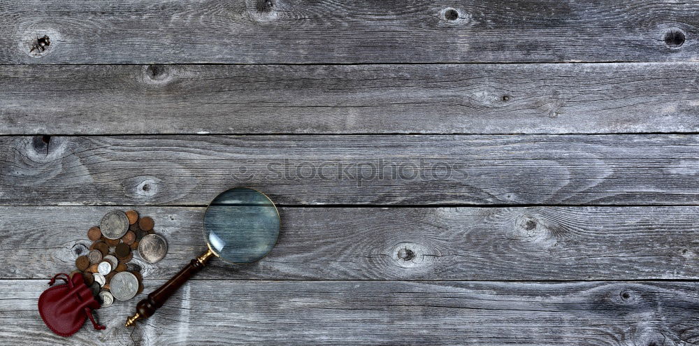 Similar – Brown wooden background with black frying pan