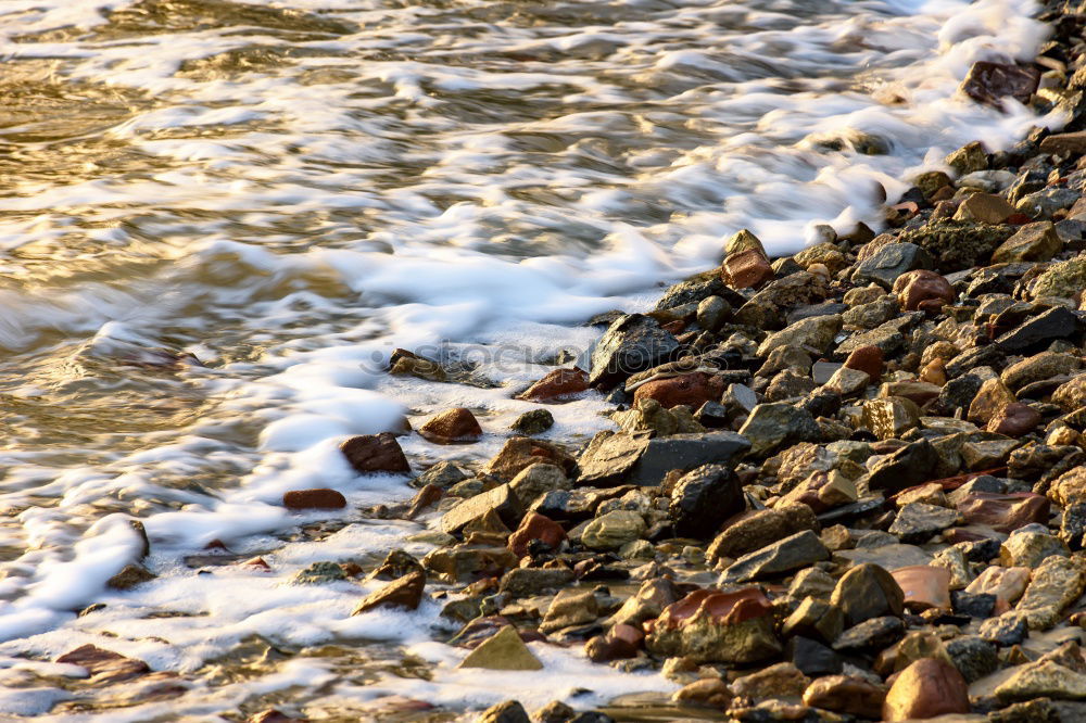 Similar – sandsteine Meer Strand