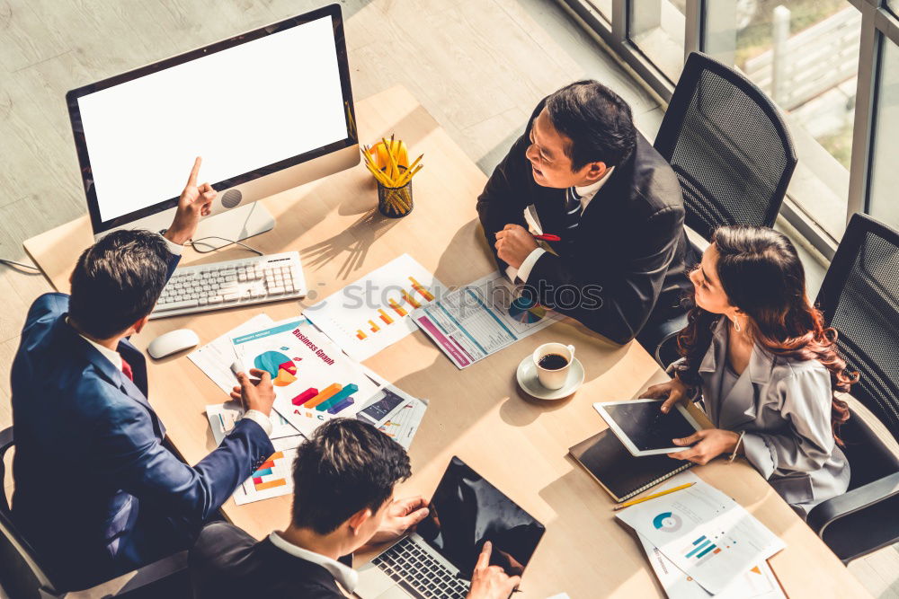 Similar – Group of young adults having a meeting in the office