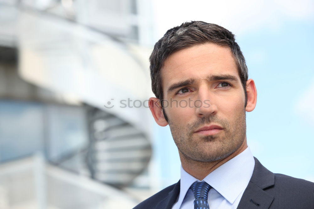 Similar – young businessman near a office building