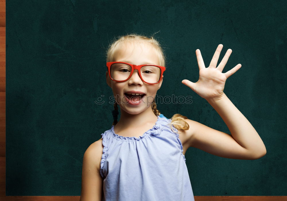 Similar – Image, Stock Photo Cute schoolgirl posing in a classroom