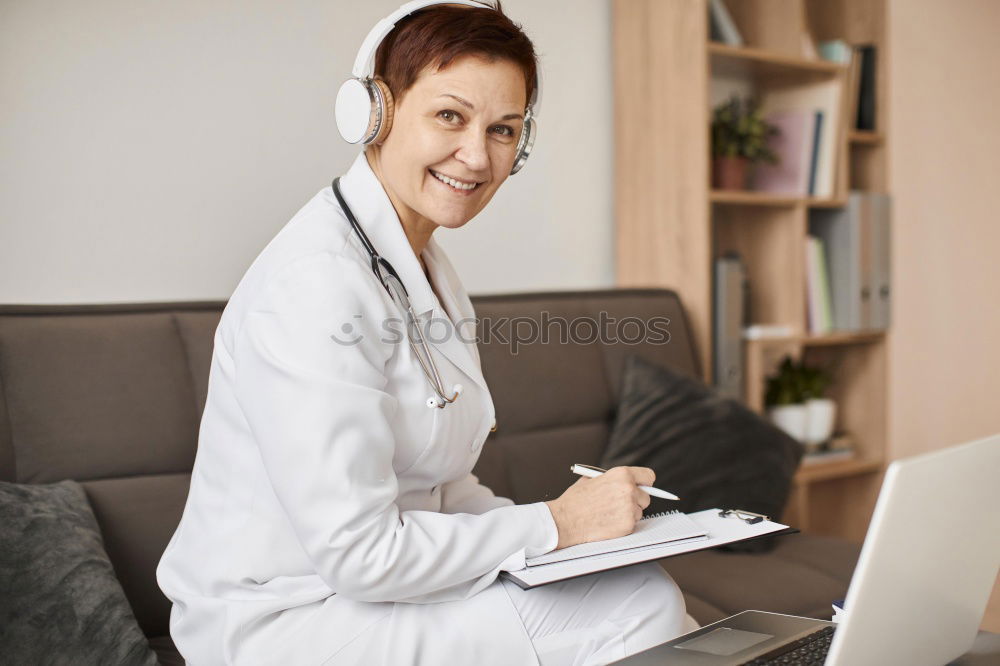 Similar – Image, Stock Photo Caregiver checking blood pressure to a senior woman