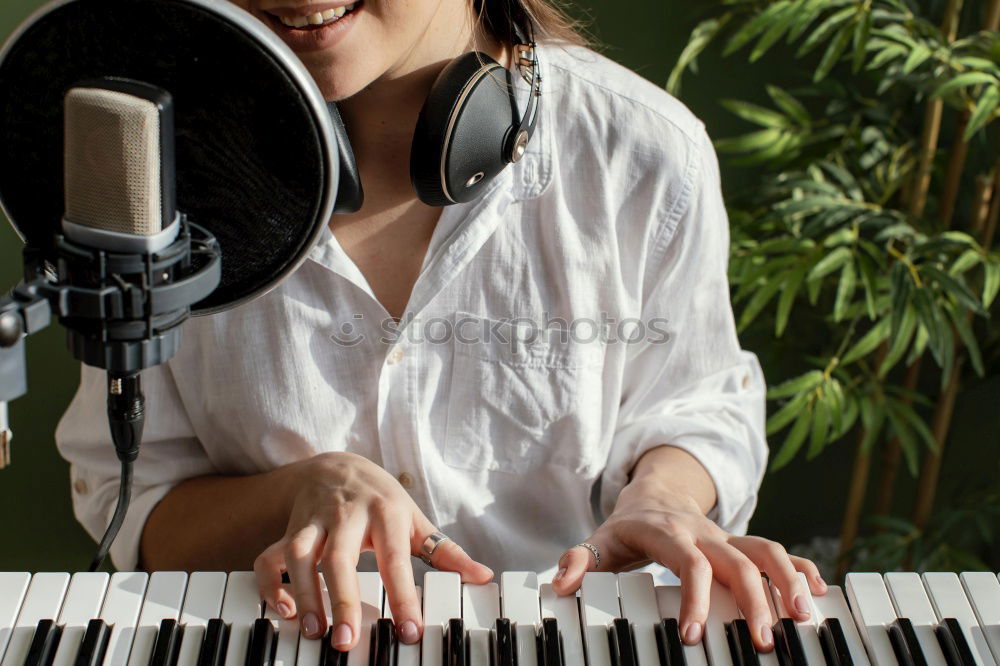 Image, Stock Photo young woman holding playing piano at home