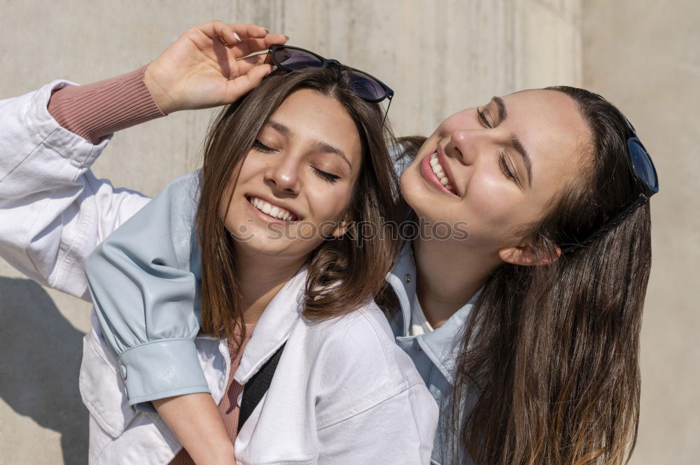 Similar – Image, Stock Photo Two young women looking at an smart phone outdoors