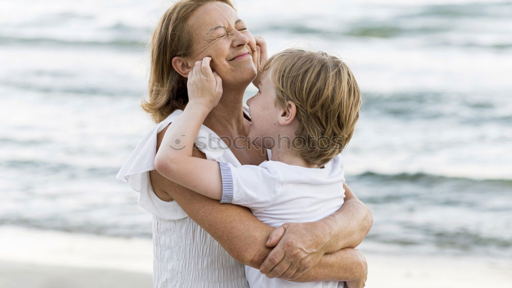 Similar – Father and children playing on the beach at the day time. Concept of friendly family.