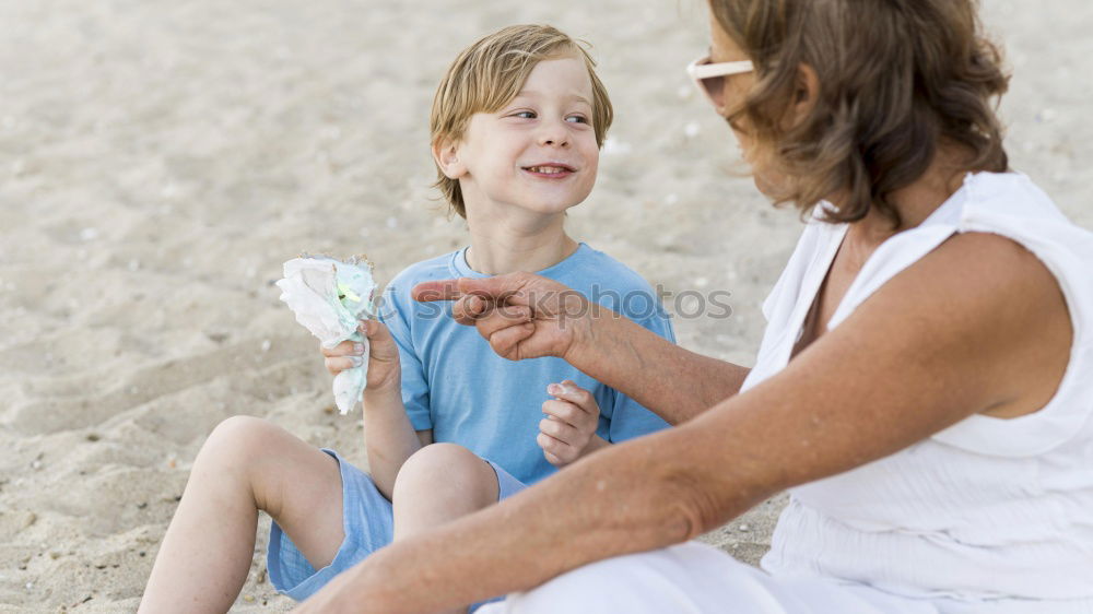 Image, Stock Photo Smiling little child with smart phone taking picture of happy grandmother and grandfather. Family leisure outdoor