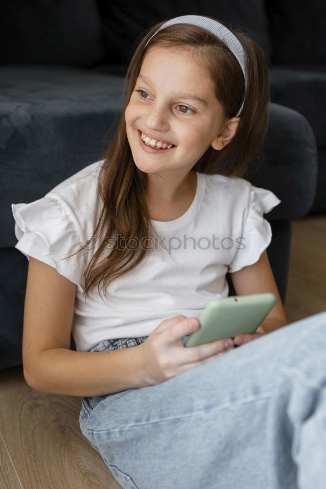 Similar – Foto Bild lustig glücklich 9 Jahre altes Kind Mädchen in der Bibliothek sitzend